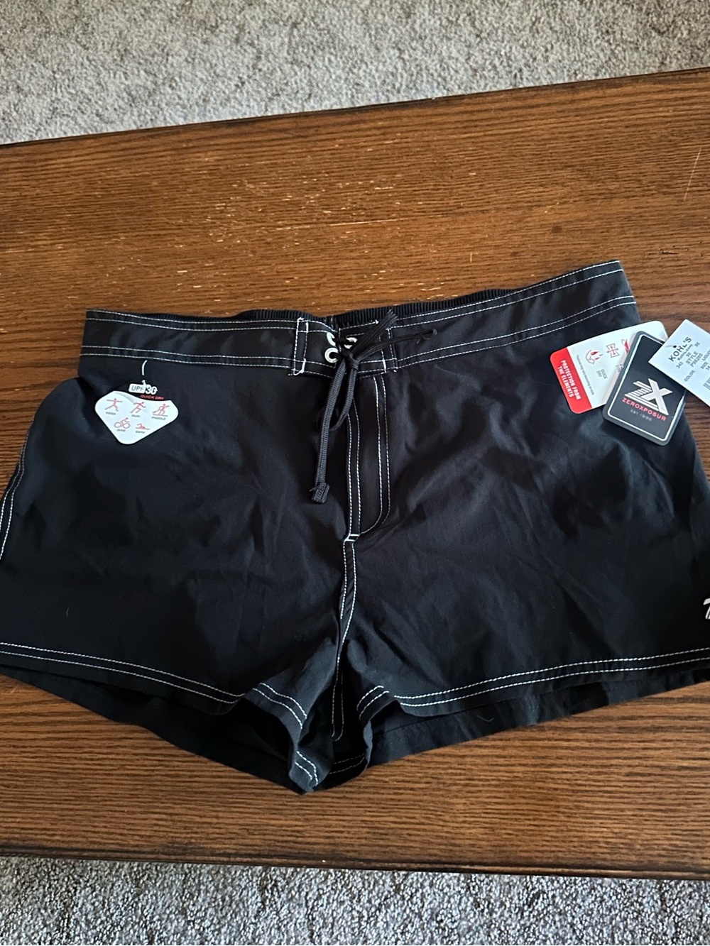 Zero Xposure Black Swim Shorts with White Contrast Stitching
